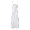 Detailed view of white long slip dress with glossy finish and slim fit silhouette - White