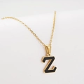 Collar minimalista de acero dorado con colgante de letra Z negra para mujer elegante - Letra Z Dorada