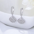 Elegant S925 sterling silver shell earrings with pavé cubic zirconia on white background - 925 Silver / Silver