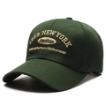 Retro dark green cotton baseball cap with 1989 New York embroidery and 45-degree angle view - Green
