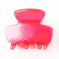 Detailed view of pink acetate hair claw clip with a glossy translucent jelly finish - Hot Pink