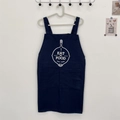 Detail of navy blue cotton apron with white cooking icon and double front pockets - EAT Blue