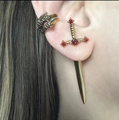 Detailed close-up of gothic sword earring with red crystals and silver claw ear cuff - Sword Style (Red Rhinestone) / Gold
