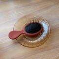 Mini spazzola per capelli compatta in terracotta con cuscinetto ad aria massaggiante - Cremisi