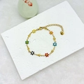 Bracelet en acier inoxydable doré 18 carats avec maillons étoiles et fleurs émaillées - Multicolore Or