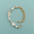Detail of bohemian acrylic link chain with gold metal and marble resin beads - White Marble-B353-4