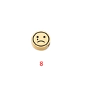 Close-up of golden stainless steel bead with engraved sad emoji for DIY jewelry making - Expression 8