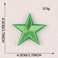 Green embroidered star patch for clothing 4.3cm size shown on beige plush background - Emerald Green Five-Pointed Star (G1L-A-1-7 Iron-On)