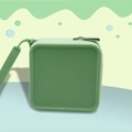 Square grass green silicone coin purse with matte texture and a silver metal zipper - Sea Green