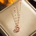 Elegant rose gold swan pendant necklace featuring a sparkling dancing crystal center - 8951 Rose Gold Swan