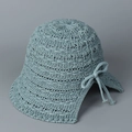 Nahaufnahme des Häkelmusters und der Schleife an diesem sommerlichen Sonnenhut - M (56-58cm) / Seegrün