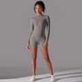 Mono deportivo de manga larga color topo con cuello alto y cremallera de alta elasticidad - S / Gris Roca Lunar