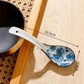 Ceramic soup spoon with blue floral pattern and size measurements 15.5cm by 4.5cm - Cherry Blossom - Curved (15.5cm)