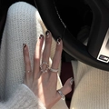 Minimalist S925 sterling silver ring set with pearls and crystals on female hand - J6358 Oval Zirconia