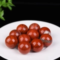 Polished red jasper stone balls in a round white tray for home decoration - Red Jasper