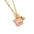 Macro shot of 18K gold plated necklace with cute pink crystal cat pendant and zircon - Pink Cat Style (XL00356)