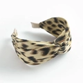 Cross-knot headband featuring a leopard print fabric design and beige lining - Khaki Leopard Print