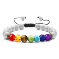 Adjustable chakra bracelet featuring white marble beads and seven colored energy stones - Howlite