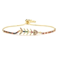 Adjustable gold fishbone bracelet featuring vibrant rainbow cubic zirconia accents - Fishbone / Gold
