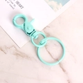 Mint green matte painted metal lobster clasp keychain with swivel ring on marble - Lake Green