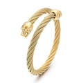 Gold twisted wire cable bangle featuring detailed skull head ends in punk style - Skull / Silver