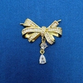 Golden bow pendant with sparkling clear rhinestones and a water drop crystal charm - Gold Bowknot Water Drop Diamond Pendant (784)