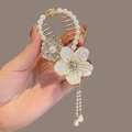 Detail of floral hair clip with imitation pearls, rhinestones and tassel pendants - F0361 Shell Flower