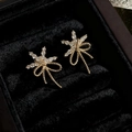 Golden snowflake and bowknot stud earrings with sparkling crystals in black jewelry box - D0853 Golden Star Bowknot