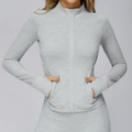 Veste de sport ajustée gris clair avec col montant et poches zippées pour le running - S / Gris Chiné