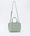 Sage green minimalist PU leather tote bag with round gold hardware and adjustable strap - Light Green