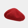 Detailed view of the red wool knitted beret showing thick ribbed texture and soft fiber - M (56-58cm) / Red