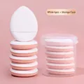 Set of 6 white teardrop finger powder puffs with clear storage case on pink background - 6 Pack + Storage Box / White