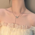 Silver butterfly pendant necklace featuring blue iridescent stones and clear crystals - Blue Phantom Butterfly Pendant (白K7938)