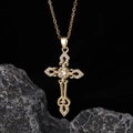 Macro shot of gold-plated cross pendant with white cubic zirconia on dark stone - Style 22: Brass Plated With Real Gold + Stainless Steel Chain (color Retention)