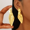 Exaggerated golden leaf-shaped metal earrings for women with a stylish abstract design - Leaf Streamline Shape (A-1071) / Gold