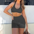 Women's two-piece yoga set in dark grey featuring halter top and high-waist shorts - S / Dark Gray