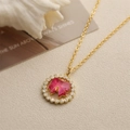 Gold pendant necklace with circular micro-paved crystal ring and red bow center stone - Round Pink Bowknot
