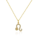 Macro detail of gold Leo zodiac pendant necklace with white and yellow zircons - Leo