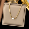 Exquisite gold beaded necklace with a natural white pearl on a beige jewelry box - [XLH39] Bean Pearl Necklace Gold