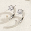 Macro view of silver U-shaped titanium steel earrings with sparkling cubic zirconia - Silver C-Shape Zirconia Style (ES2343-2)