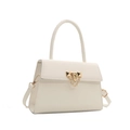 Chic cream white crossbody handbag for women featuring gold chain and trapezoid design - White