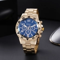 Men's gold steel watch with blue chronograph dial shown in professional studio lighting - Gold Band Black Dial