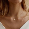 Elegant 18K gold plated stainless steel necklace featuring a white freshwater pearl pendant - Pearl Necklace