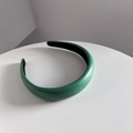 Close-up of green PU leather headband with stylish wide frame and black lining - 3CM Wide / Green