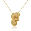Macro shot of gold-plated 3D bubble letter F pendant necklace with pavé zircon stones - Letter F (D1079-F)
