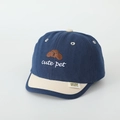 Detailed view of navy blue baby sun hat with cute dog embroidery and beige brim - Style 3 Blue