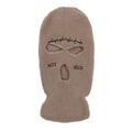 Close-up of light brown knitted balaclava showing detailed texture and black embroidery - Khaki