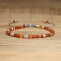 Adjustable woven bracelet with orange emperor stones and silver spacer beads - No.76 Red Agate Braided