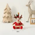 Christmas reindeer plush doll in red sweater with snowflake patterns and golden antlers - Sitting Reindeer