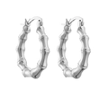 Detailed view of silver bamboo-style hoop earrings with smooth metallic texture - Silver Bamboo Hoop